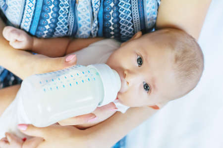 How to burp baby during bottle feeding and reduce gas issues in Indian infants